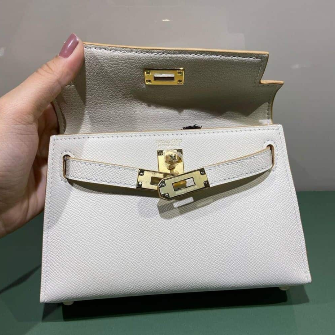 HERMÈS KELLY 20 BAG WITH GOLD HARDWARE IN OFF-WHITE