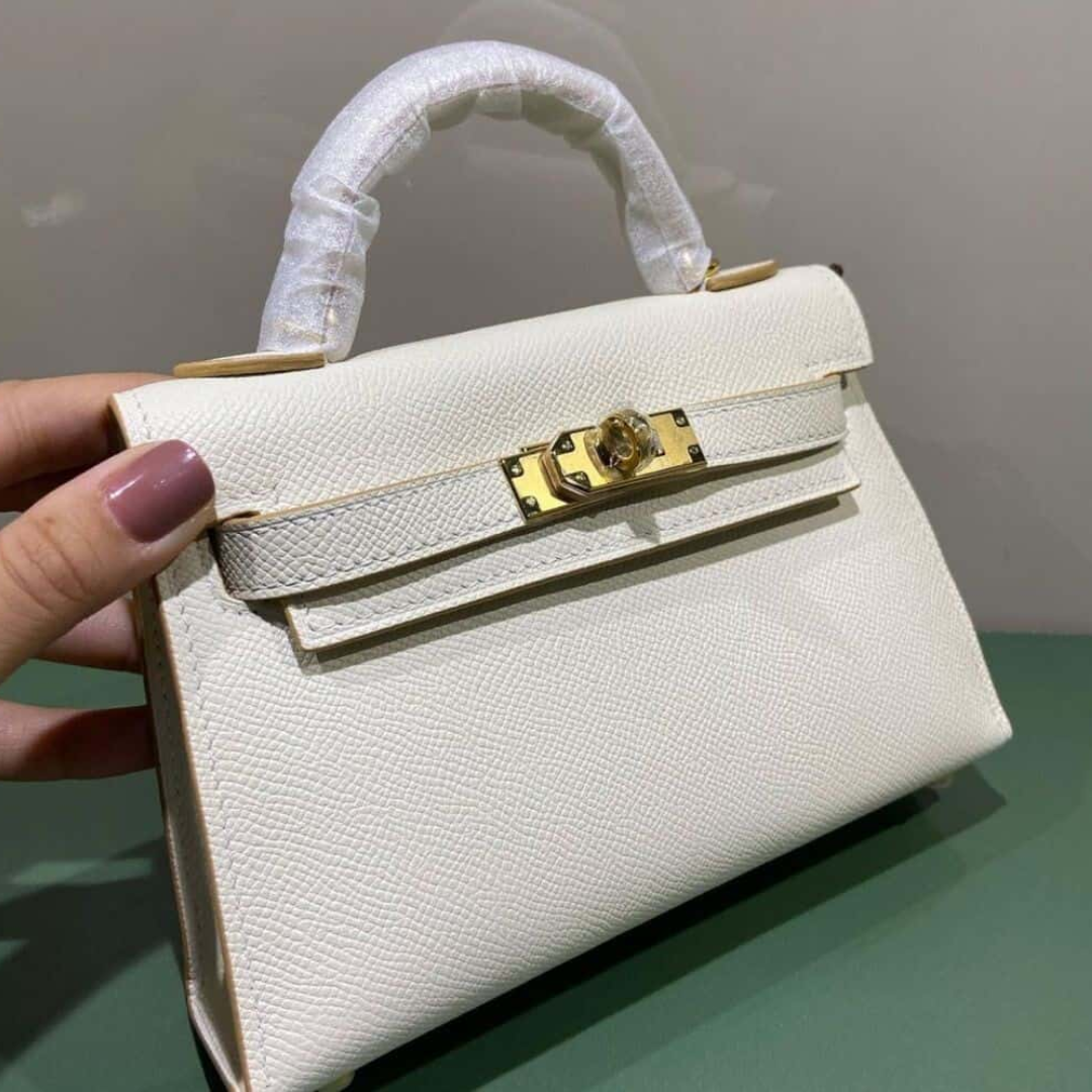 HERMÈS KELLY 20 BAG WITH GOLD HARDWARE IN OFF-WHITE